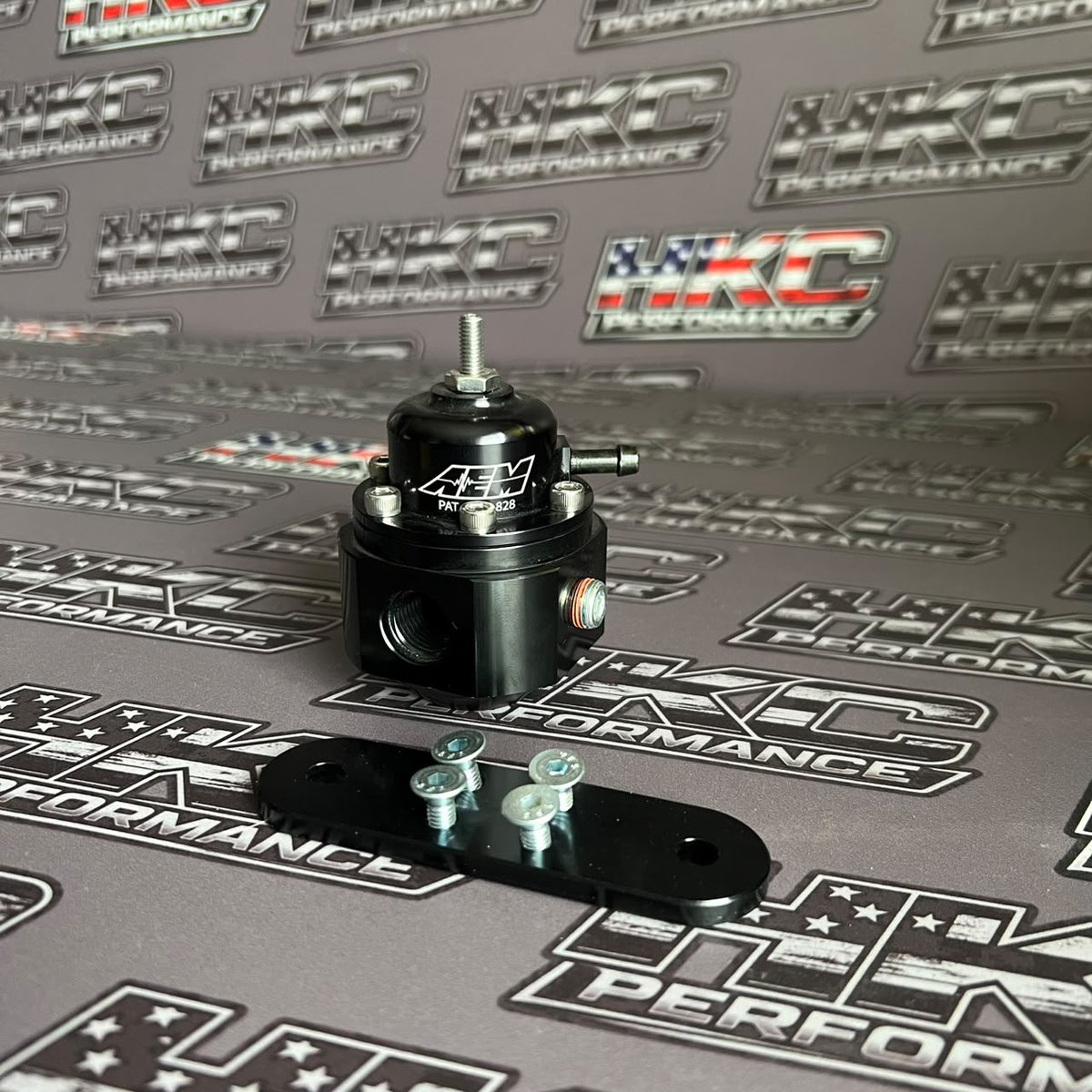 Regulador de combustible AEM  billet original.
