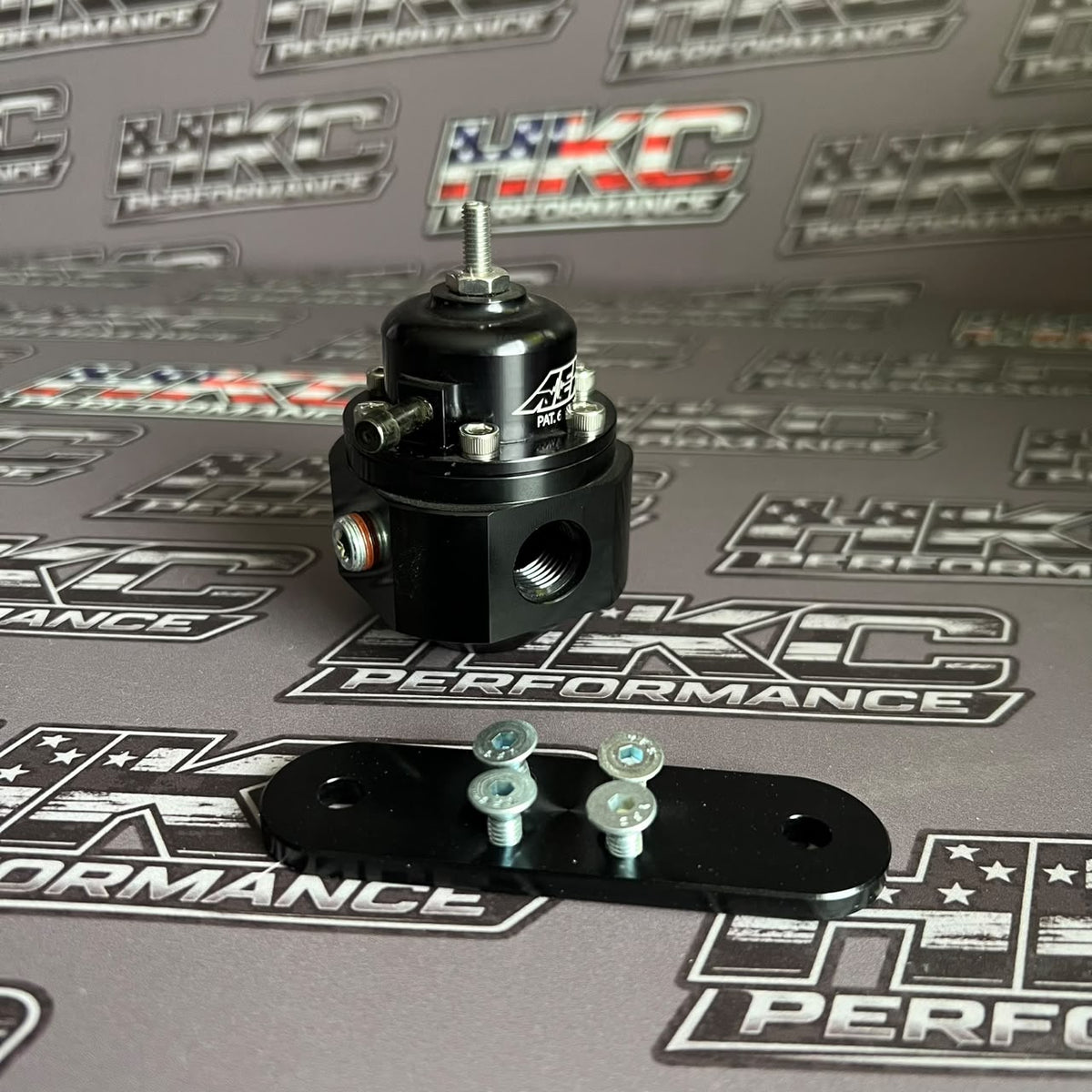 Regulador de combustible AEM  billet original.