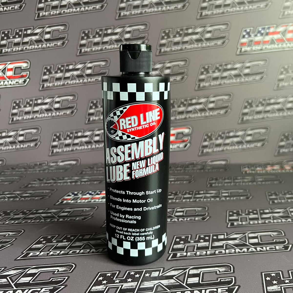 Lubricante líquido para ensamblaje, Redline, liquid assembly lube negra 12z (355ML )